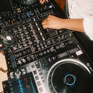 Close up of DJ on decks