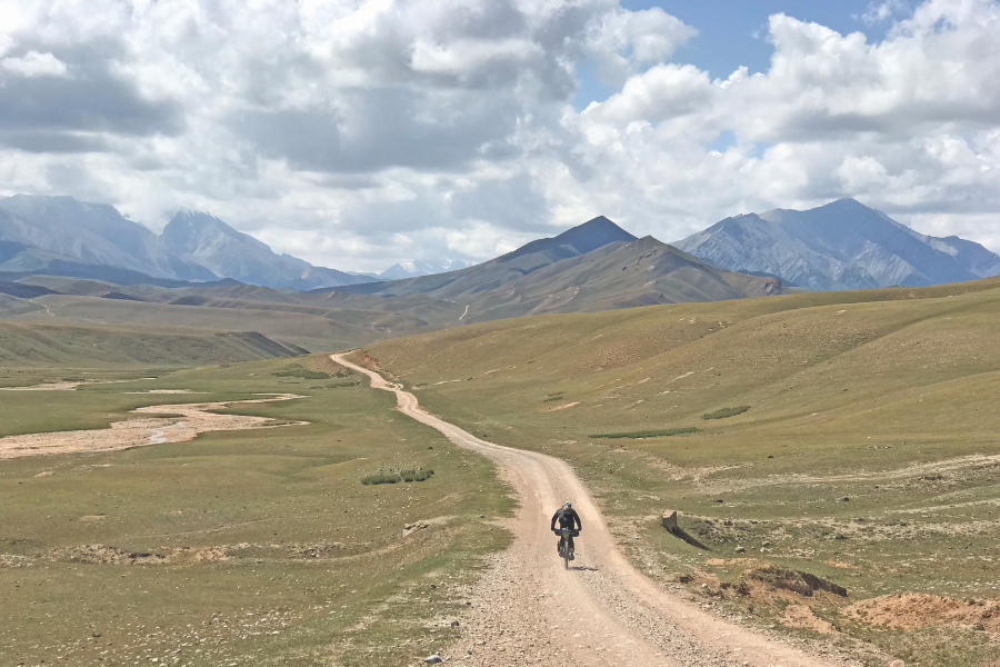 Markus Stitz on his bicycle on the Silk Road through Kyrgyzstan