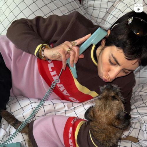 A woman and her dog wearing matching Hox x Barc jumpers