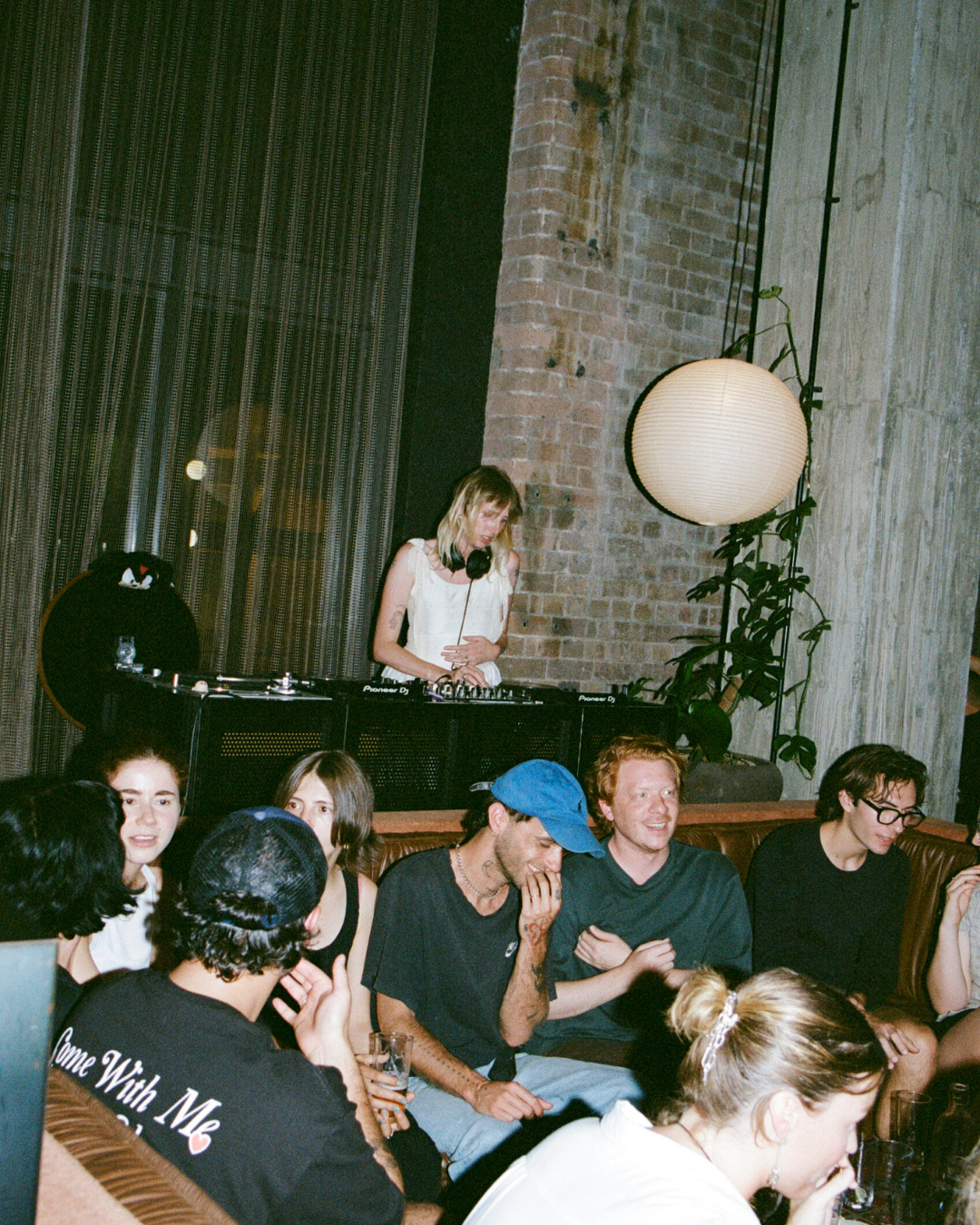 a dj spinning at the lobby of ace hotel sydney 